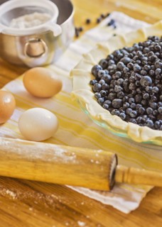 Ingredients for berry pie on table