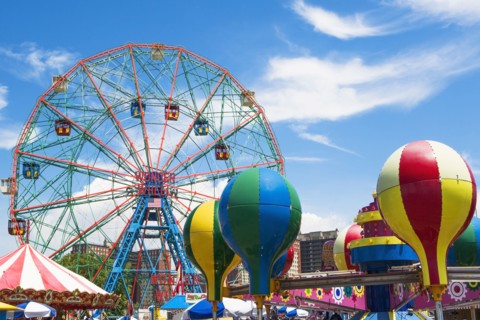 Ferris wheel against blue sky