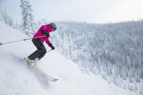 Woman skiing downhill