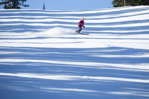 Woman skiing downhill