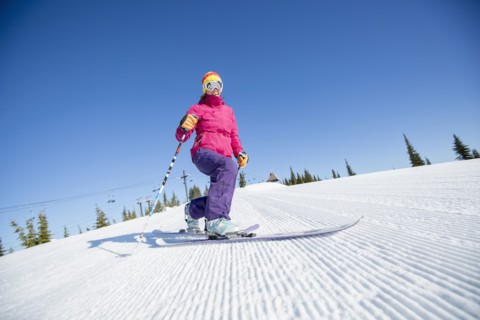 Woman skiing downhill