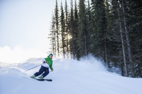 Man skiing downhill