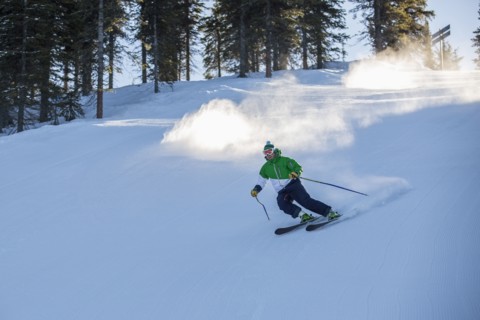 Man skiing downhill