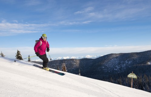 Woman skiing downhill