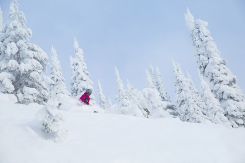 Low angle view of mature woman on ski slope