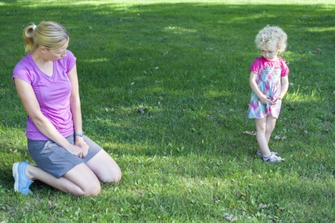 Mother copying daughter's (4-5) facial expression