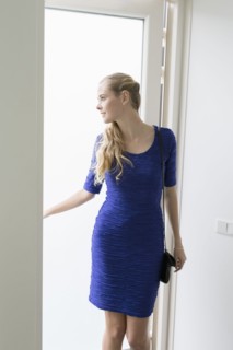 Woman opening door
