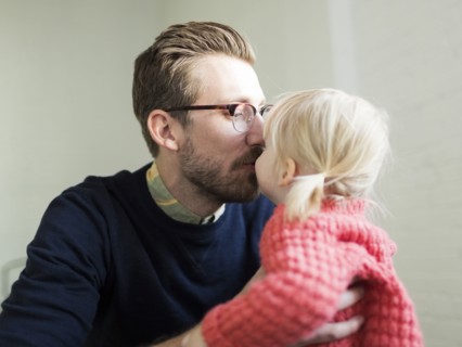 Father kissing daughter's (2-3) nose
