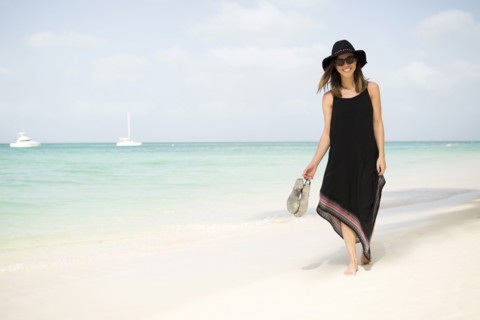 Woman walking on beach