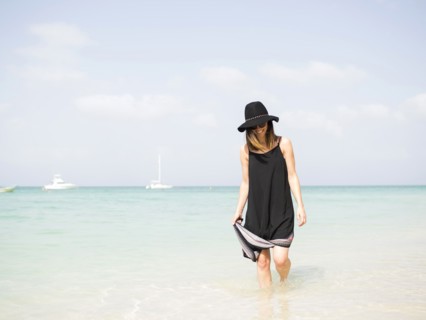 Woman walking on beach