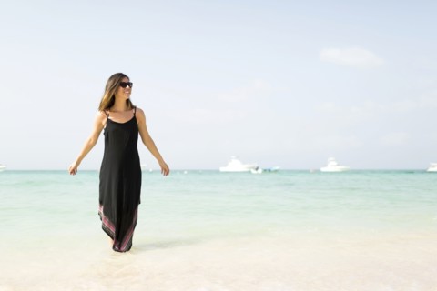 Woman walking on beach