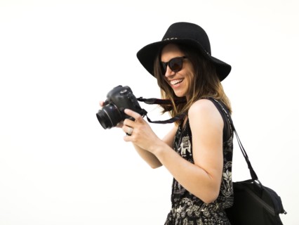 Woman taking photos during vacations