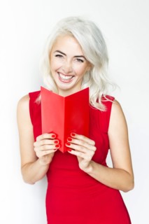 Studio shot of woman wearing red dress
