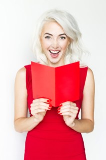 Studio shot of woman wearing red dress