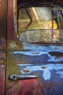 Colorful door of abandoned truck