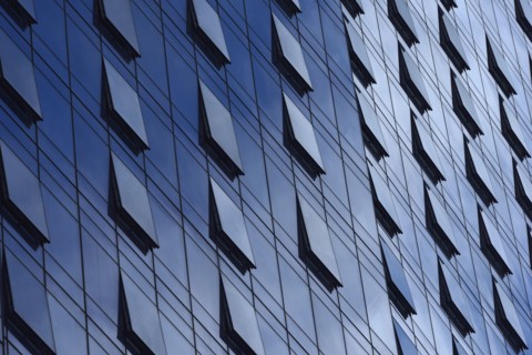 Open windows on glass building