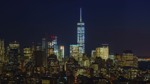 Illuminated cityscape at night. New York City, New York, USA.