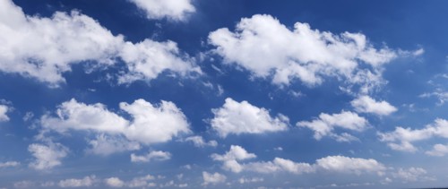 Clouds against blue sky.
