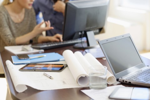 Man and woman working in office.