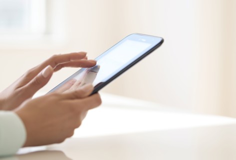 Hands using tablet pc.