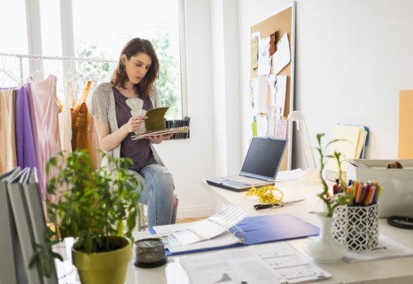 Female fashion designer in her office.