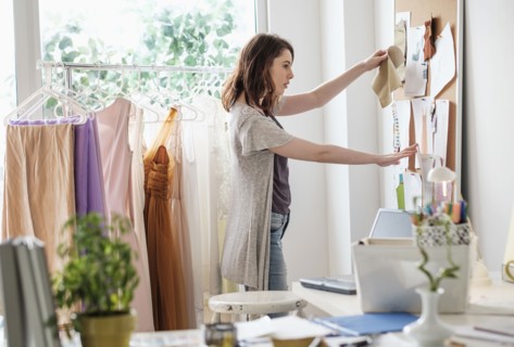 Female fashion designer in her office.
