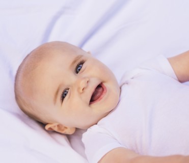 Portrait of smiling baby boy (6-11 months)