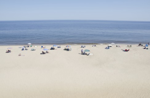 People relaxing on beach