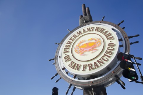 Commercial sign against clear sky