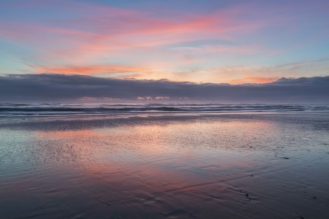 Sky reflecting in water at sunset