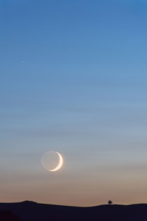 Moon on sky at sunset