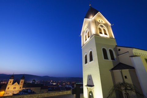 Illuminated church at dusk