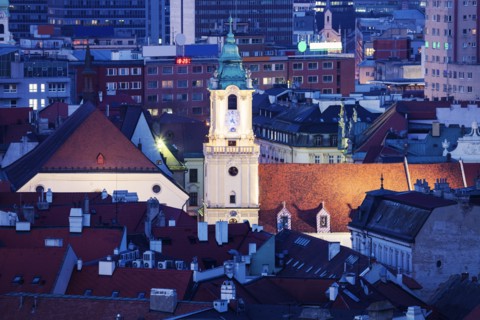 Clock tower among buildings