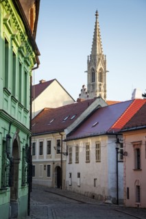 Townhouses with church tower in background