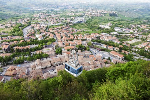 Overhead cable car with townscape in background