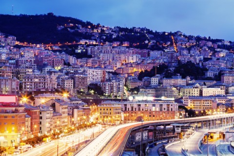 Highway along illuminated city