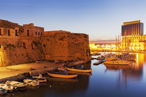Marina and Castello Angiono at sunrise