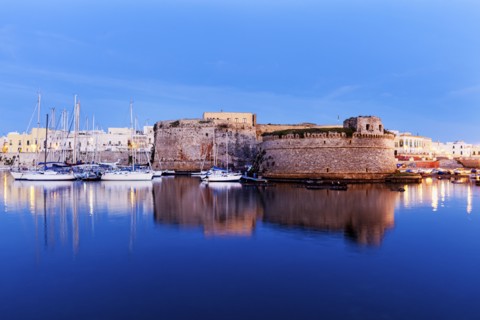 Marina and Castello Angiono at sunrise