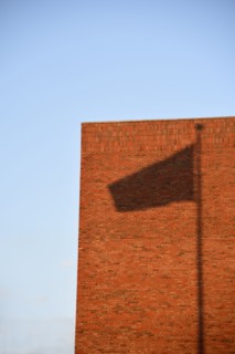 Shadow of flag on wall