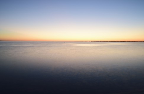 Horizon over water at dusk
