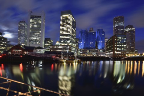 Waterfront reflected in Fort Point Channel at dawn