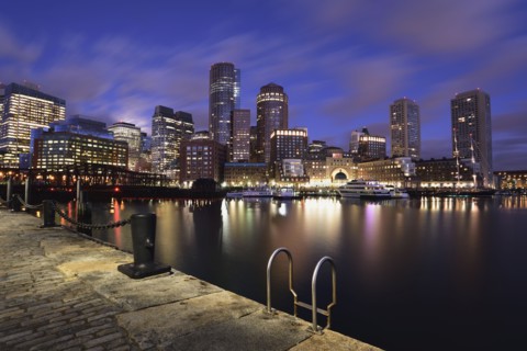 Waterfront reflected in Fort Point Channel at dawn