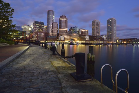 Waterfront reflected in Fort Point Channel at dawn