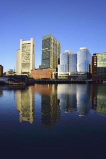City waterfront reflected in Fort Point Channel