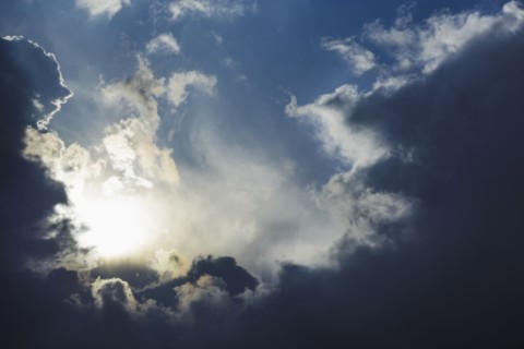 Dramatic sky, clouds and sun trying to break through
