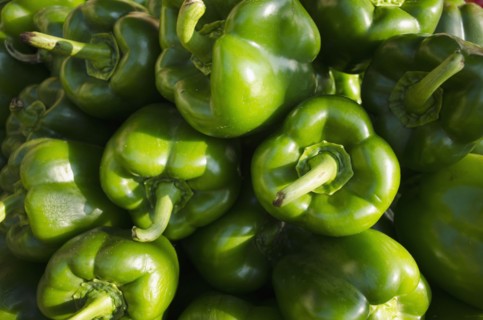 Full frame of green bell peppers
