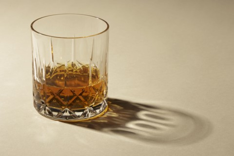 Studio shot of glass with alcohol