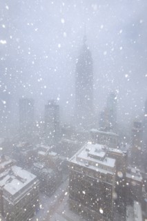 Empire State Building during blizzard. New York City, New York, USA.