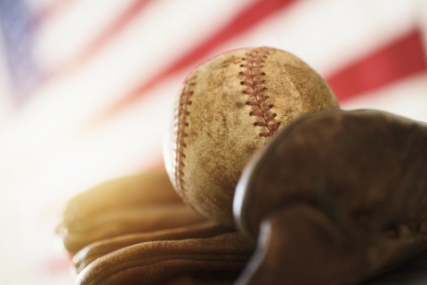 Close-up of baseball glove and ball.