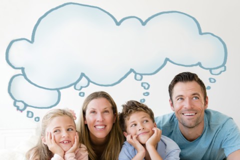 Family with two children (6-7, 8-9) day dreaming